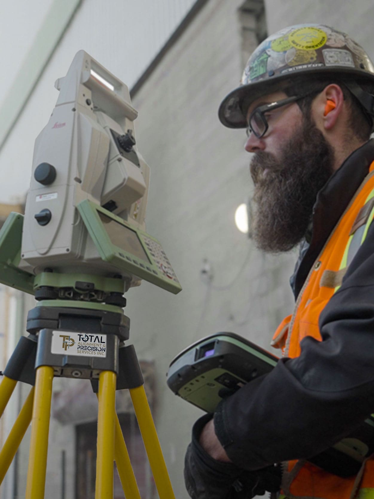 Nick Alignment Total Precision employee, Nick uses alignment equipment on site